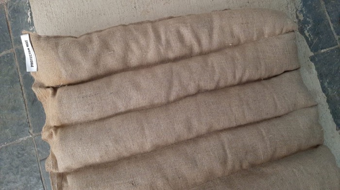 Oil absorbent booms stacked